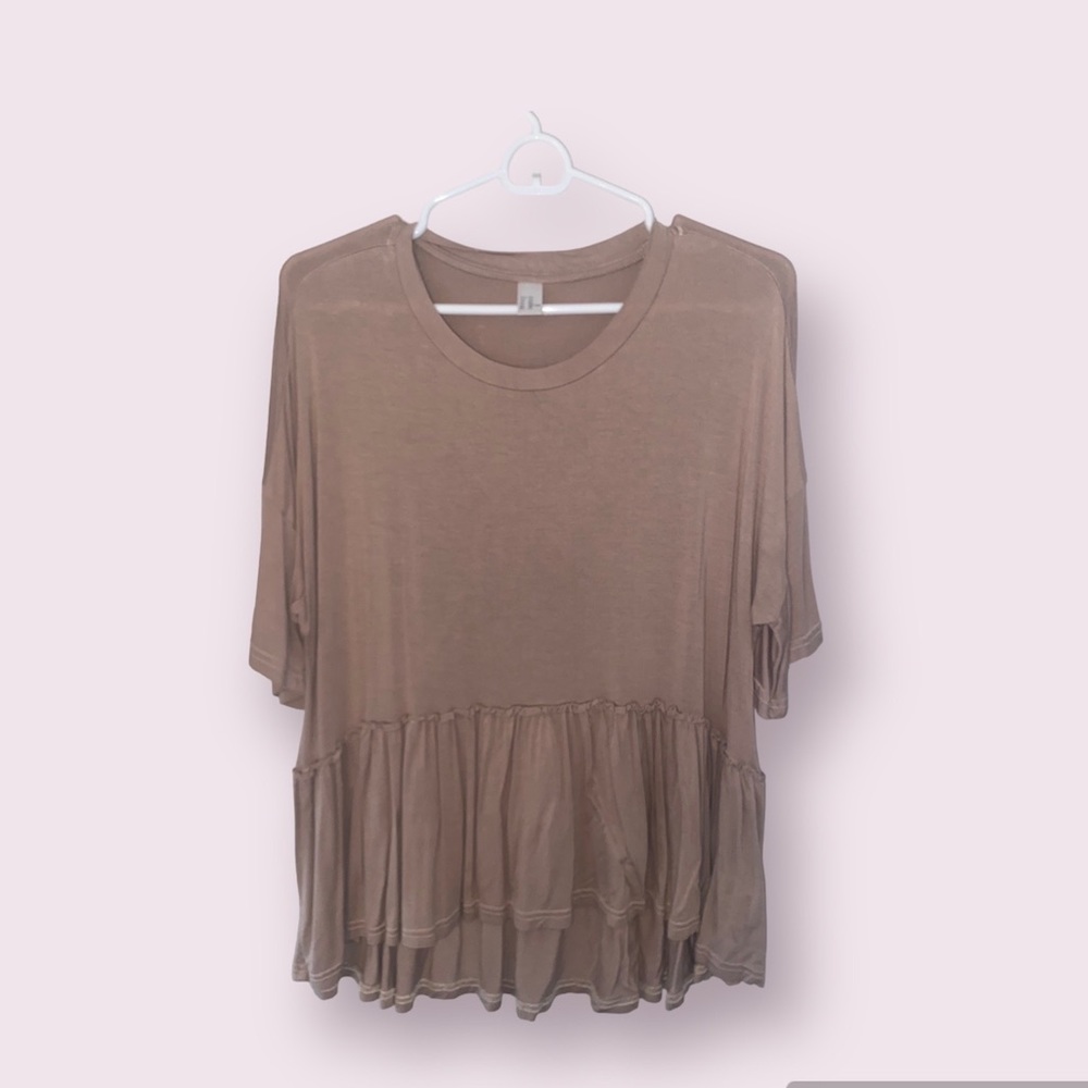 Loose fitting peplum top from Amazon. Women’s size xxl